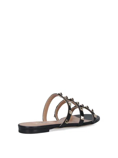 Valentino Rockstud Slide Sandal In Laminated Nappa With Cabochon In Black