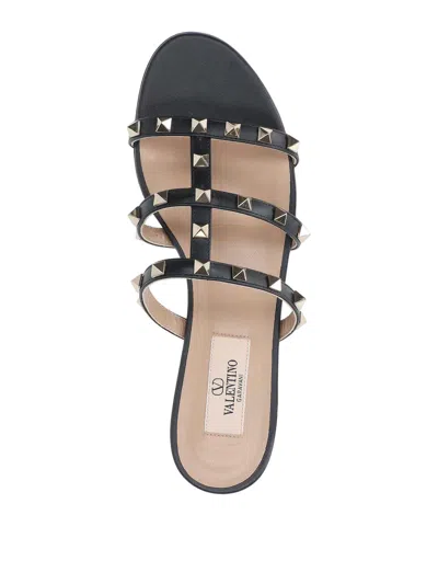 Valentino Rockstud Slide Sandal In Laminated Nappa With Cabochon In Black