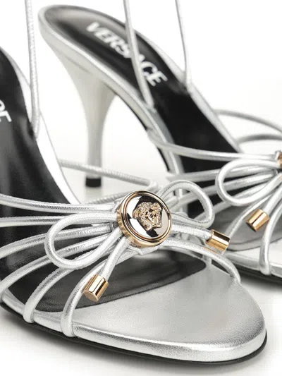 Versace Embellished Metallic Leather Sandals In Silver