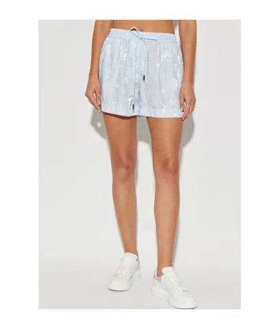 Alexander Mcqueen Shorts With A Skull Pattern In Blue