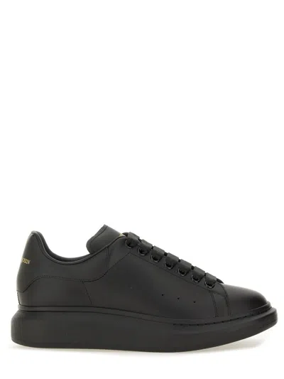 Alexander Mcqueen Black Oversize Sneakers With Logo Lettering On The Heel In Leather Man In Animal Print