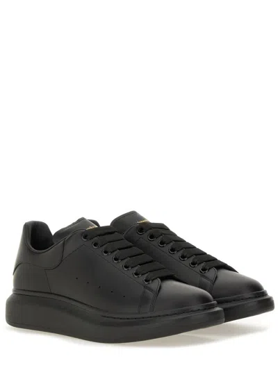 Alexander Mcqueen Black Oversize Sneakers With Logo Lettering On The Heel In Leather Man In Animal Print