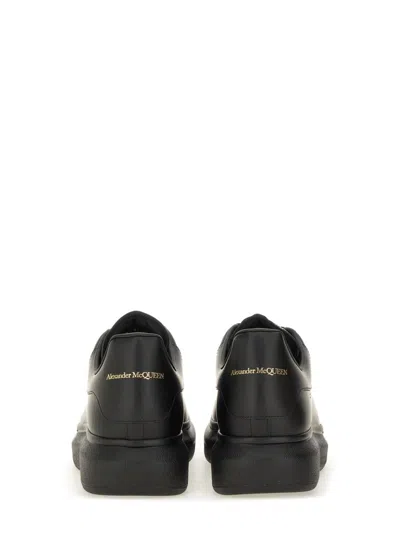 Alexander Mcqueen Black Oversize Sneakers With Logo Lettering On The Heel In Leather Man In Animal Print