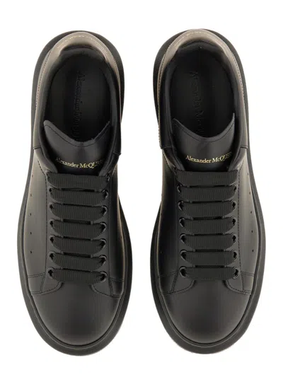 Alexander Mcqueen Black Oversize Sneakers With Logo Lettering On The Heel In Leather Man In Animal Print