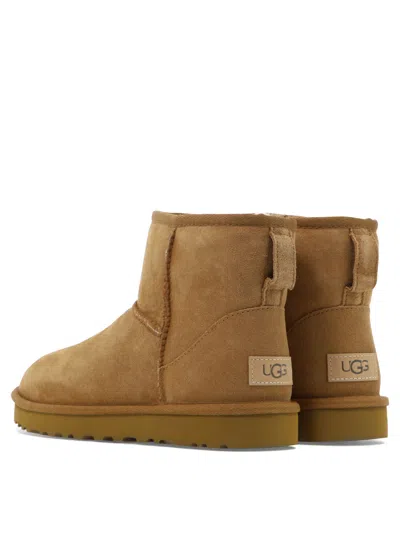 Ugg Classic Mini Suede Ankle Boots In Brown