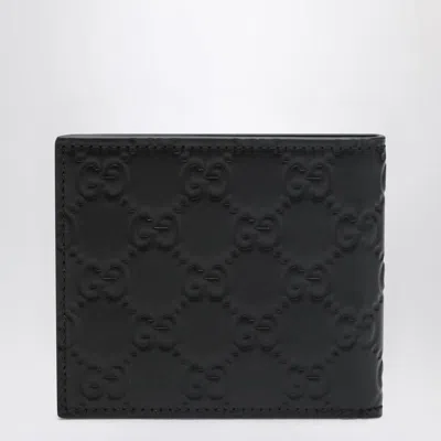 Gucci Men Gg Emblem Leather Wallet With Embossed Gg Logo In Black