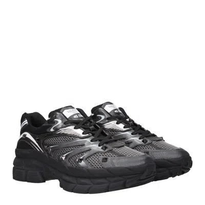 Valentino Garavani Leather Sneakers With Textured Rubber Elements In Black