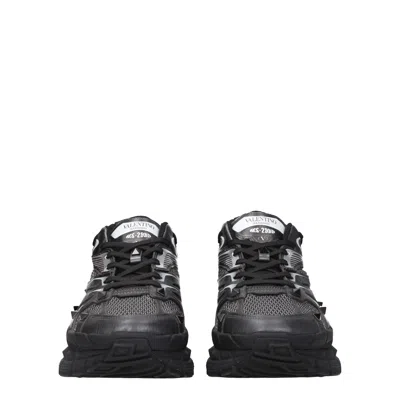 Valentino Garavani Leather Sneakers With Textured Rubber Elements In Black