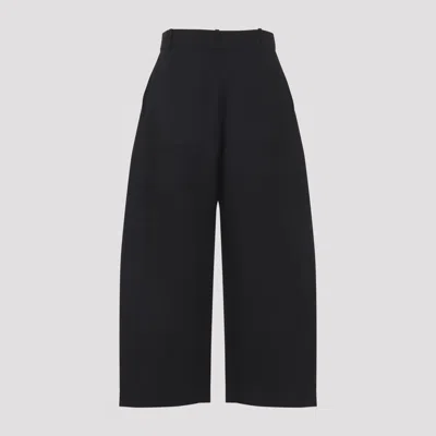 Studio Nicholson Buttoned High-waisted Trousers In Black