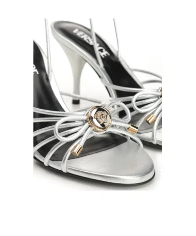 Versace Opera Bow Strappy Ankle Strap Sandal In Silver