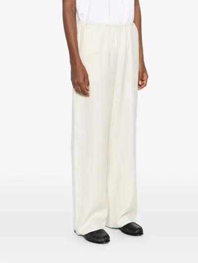 Totême Monogram-pattern Trousers In White