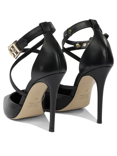 Ninalilou Buckled-strap Pointed-toe Pumps In Black
