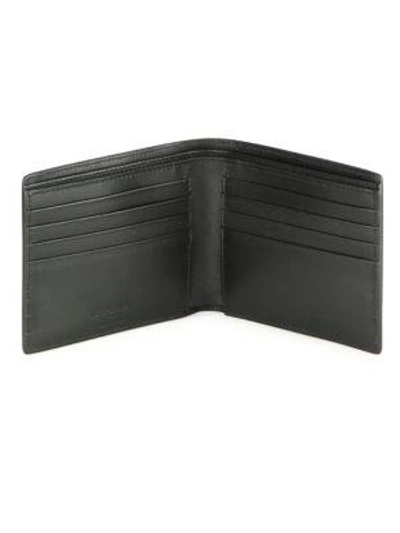 Shop Saint Laurent Bi-fold Leather Wallet In Na