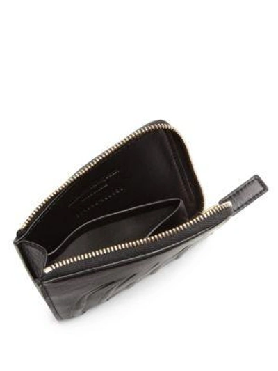 Shop Alexander Mcqueen Embossed Leather Pouch In Na