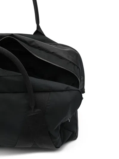A Kind Of Guise X Nanamica Black Holdall In Black