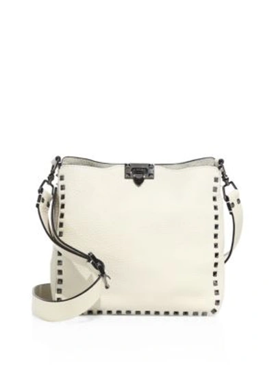 Shop Valentino Rockstud Small Leather Hobo Bag In Ivory