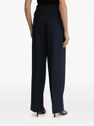 Stine Goya Belted-fastening Pleated Trousers In Blue