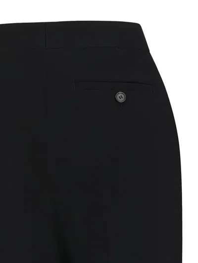 Givenchy Buttoned-pocket Trousers In Black