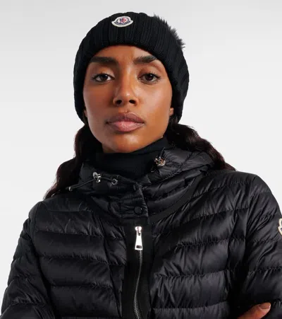 Moncler Ribbed Knit Wool Beanie With Faux Fur Pom-pom In Black
