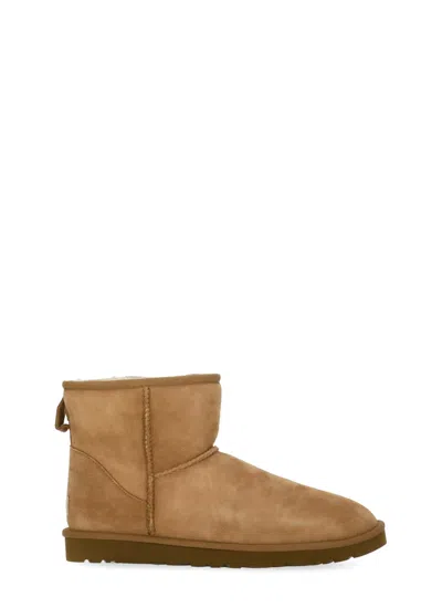 Ugg Classic Mini Brown Ankle Boots With Logo Patch On The Rear And Shearling Lining In Suede Man In Brown