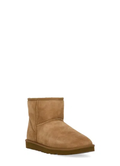 Ugg Classic Mini Brown Ankle Boots With Logo Patch On The Rear And Shearling Lining In Suede Man In Brown