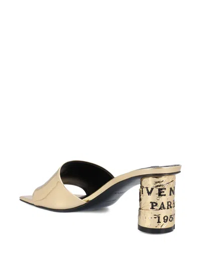 Givenchy 65mm Logo Heel Metallic Leather Mule Sandals In Gold