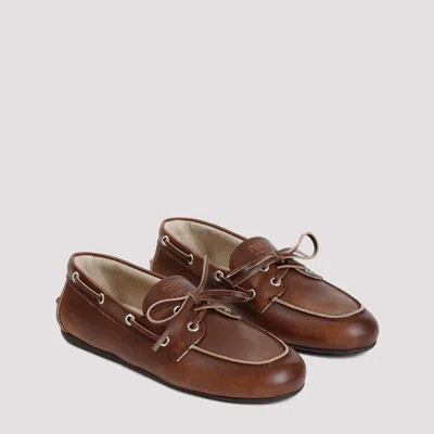 Miu Miu Unlined Bleached Leather Loafers In Brown