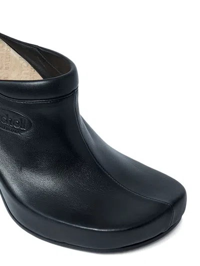 Balenciaga Debossed Logo Heeled Mules In Black