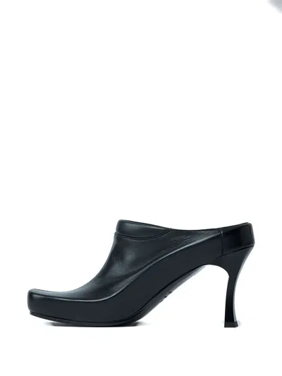 Balenciaga Debossed Logo Heeled Mules In Black