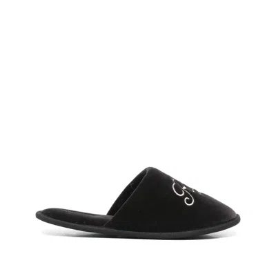 Frame Flat Sandals In Black