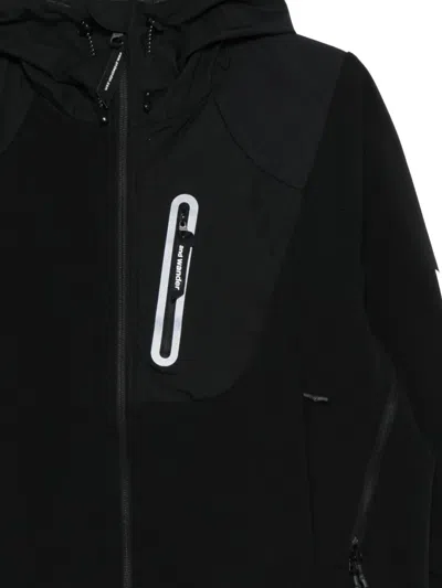 And Wander Stretch Shell Jacket In Black