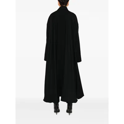 The Nina Studio Asymmetric Coat In Black