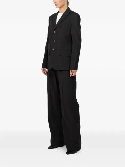 Tibi Button-fastening Flap-pocket Blazer In Black