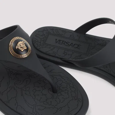 Versace Flat Sole Open Toe Sandals With Medusa Motif In Black