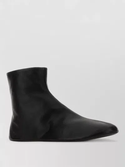 The Row Leather Ankle Boots Lined With Soft Shearling In Black