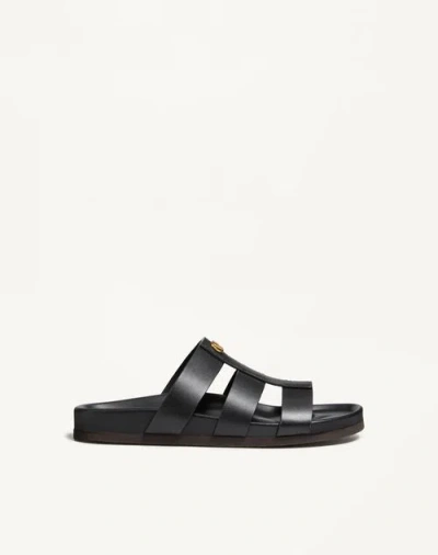 Valentino Garavani Studshield Logo-embellished Leather Sandals In Black