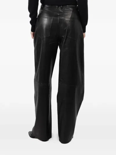 Ezr Button Trousers In Black