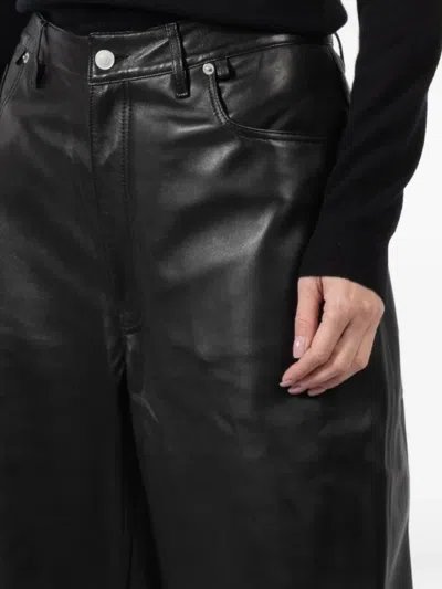 Ezr Button Trousers In Black