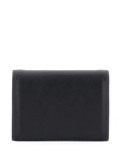 Givenchy Logo Embossed Bi-fold Wallet In Black
