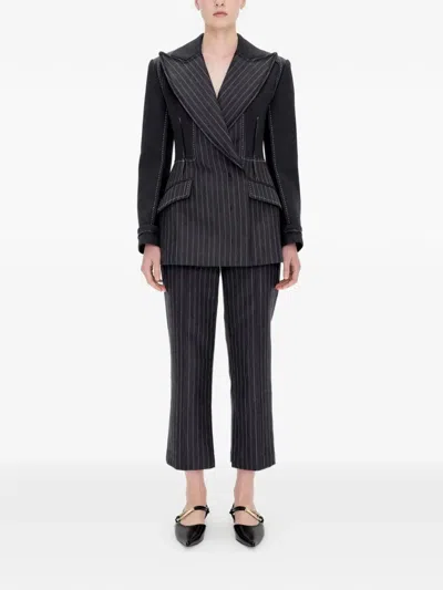 Simkhai Vera Pinstripe-pattern Trousers In Black