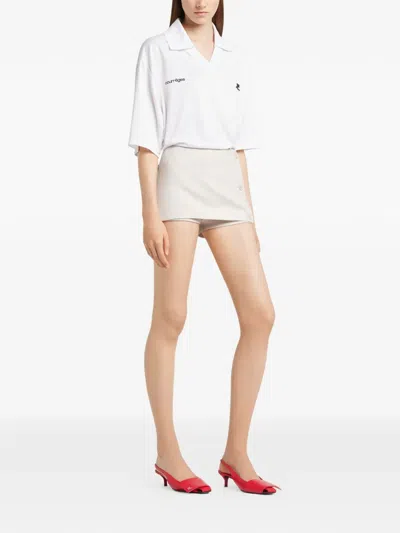 Courrèges Button Mini Shorts In Neutral