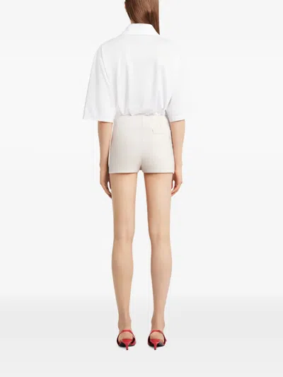 Courrèges Button Mini Shorts In Neutral