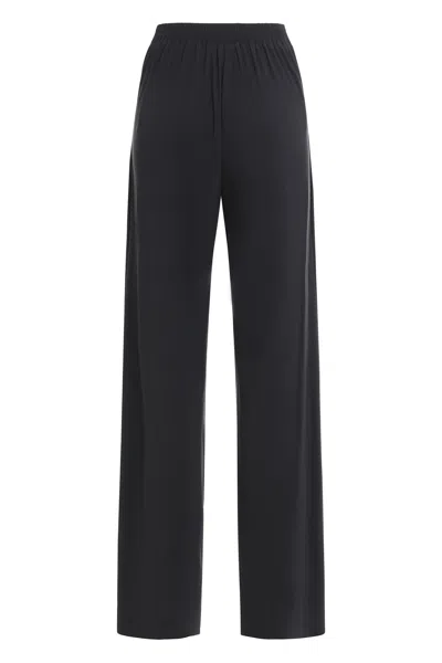 Amazuìn Technical Fabric Trousers In Blue