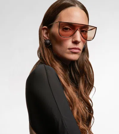Alaïa Shield Sunglasses In Gold