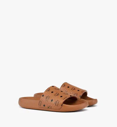 Mcm Male Monogram Print Rubber Slides In Brown