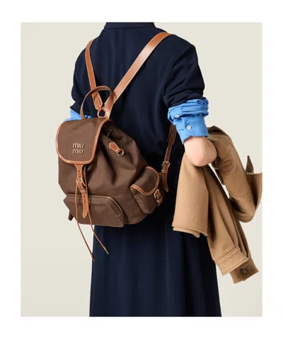 Miu Miu Canvas And Leather Backpack In Brown
