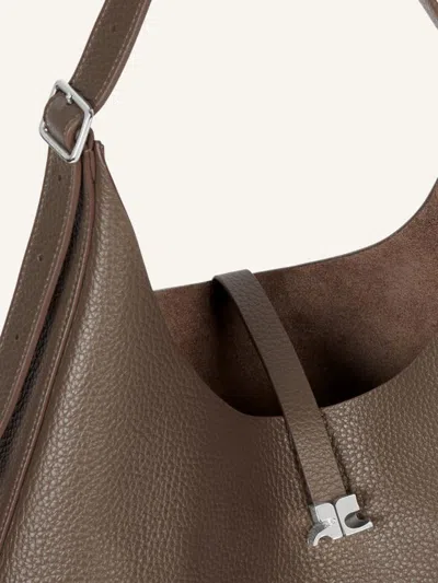 Courrèges Logo-buckle Shoulder Bag In Pattern