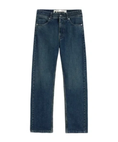 Jil Sander Multi-stitched Embossed Logo Trousers In Blue