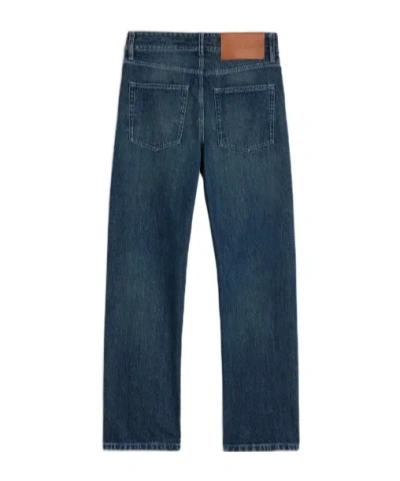 Jil Sander Multi-stitched Embossed Logo Trousers In Blue