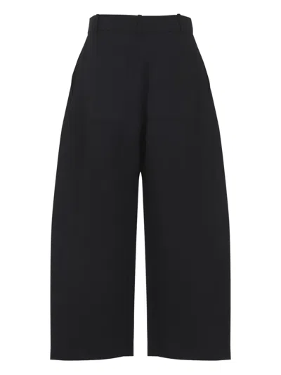 Studio Nicholson Buttoned High-waisted Trousers In Black